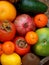 Composition of mix colored tropical and mediterranean fruits on wooden background. Concepts about decoration, healthy eating