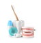 Composition with model of oral cavity and dental care items on white background.