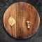 Composition of mushrooms, leaf and needles on a round wooden plate. minimalism Panel Top view