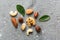 Composition of nuts , flat lay - mix hazelnuts, cashews, almonds on table background. healthy eating concepts and food