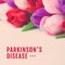 Composition of parkinson\\\'s disease day text over bunch of multi coloured tulips