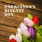 Composition of parkinson\\\'s disease day text over bunch of multi coloured tulips