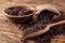 Composition raw wild rice on wooden background