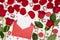 Composition of red roses, chocolates, sequins hearts, envelopes, candles on white background. Content for Birthday, Valentines Day