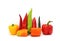 Composition of several types of sweet pepper of different shapes, colors and sizes on a light background.