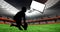 Composition of silhouette of male rugby player over stadium