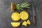 Composition with slices of delicious pineapple on grey background
