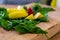 Composition of spinach, sliced apples and a strawberry