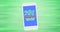 Composition of stay natural text and leaf logo on blue smartphone screen, over green stripes