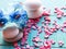 composition still life with blue flowers, massage stones, Spa concept, the substrate, a space on a wooden blue background