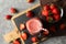 Composition strawberry cocktail on gray table. Summer berry