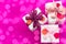 Composition three white boxes with a Satin ribbon Bow Background Saturation pink.