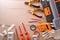 Composition of tools for electrical repairs on wooden table