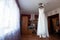 Composition - a wedding dress on a gray blue wall with decor and accessories. The concept of marriage, family relationships,