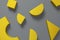 Composition of yellow geometric shapes on gray background. Colors of Year 2021 Pantone Illuminating and Ultimate gray