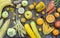 Composition of yellow vegetables and fruits - banana, corn, lemon, plum, apricot, pepper, zucchini, tomato, asparagus beans, ginge