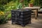 compost bin with built-in drainage system and spigot for easy collection