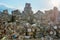 Compressed aluminium scrap in large cubes forming landfill in piles.