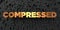Compressed - Gold text on black background - 3D rendered royalty free stock picture
