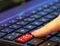 Computer fire red button malicious attack dark web virus malware ransomware trojan