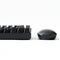 Computer mouse and a fragment of a black mechanical gaming computer keyboard on a white background. Wireless input devices for