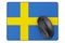 Computer mouse and mouse pad with Swedish flag, 3D rendering