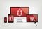 Computer, phone, laptop screens with christmas shopping icons an