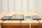 Computer tablet and mobile phones charging on home desk