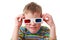 Concentrated boy in shirt and anaglyph glasses