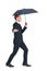 Concentrated businessman with umbrella walking