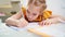 A concentrated and diligent schoolgirl does her homework. selective focus