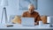 concentrated elderly man working on laptop