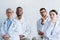 concentrated multiethnic doctors in white coats