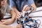 Concentrated pupils testing electronic robot in the laboratory