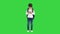 Concentrated School girl with backpack typing on her pink phone on a Green Screen, Chroma Key.