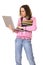 Concentrated woman with laptop and pile of books