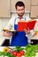 Concentrated young man reading cookbook