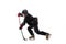 Concentration. Child, hockey player with the stick on ice court and white background.