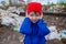 Concentration - a child in horror grabs his head from unauthorized garbage collection, environmental pollution, violation of the