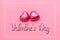 Concept of 14 february or Valentine Day. Chocolate bonbons hearts in a pink wrapper. Pink background. Valntine`s Day and frame