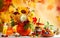 Concept of autumn festive decoration for Thanksgiving day or Halloween. Autumn bouquet of beautiful flowers and berries in a