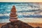 Concept of balance and harmony - stone stack on the beach