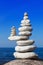 Concept of balance and harmony. White rocks zen on the sea.