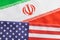 Concept of bilateral relations of US and Iran showing with flag