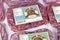 Concept for biologically appropriate raw food for dogs or cats in packaging containing raw frozen beef and chicken meat