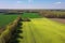 This concept captures the vibrant and picturesque beauty of crop fields when viewed from above.