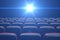 Concept cinema, shining blue color in movie theater. Rows of chairs with empty seats. 3d illustration