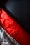 Concept closeup waving abstract fabric Indonesia independence day flag on Black background
