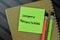 Concept of Company Restructuring write on sticky notes isolated on Wooden Table