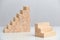 The concept of comparing small and medium-sized businesses. Wooden blocks on a white background background